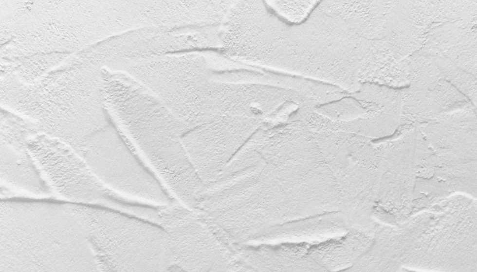 Pintura blanca per a pintar parets rugoses